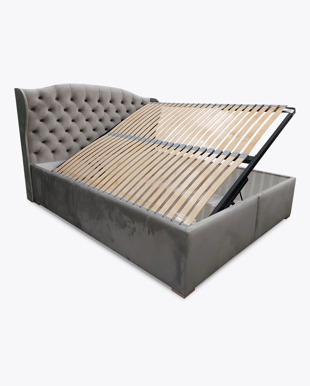 Bedroom bed 18. with a container on the side. - Image 2